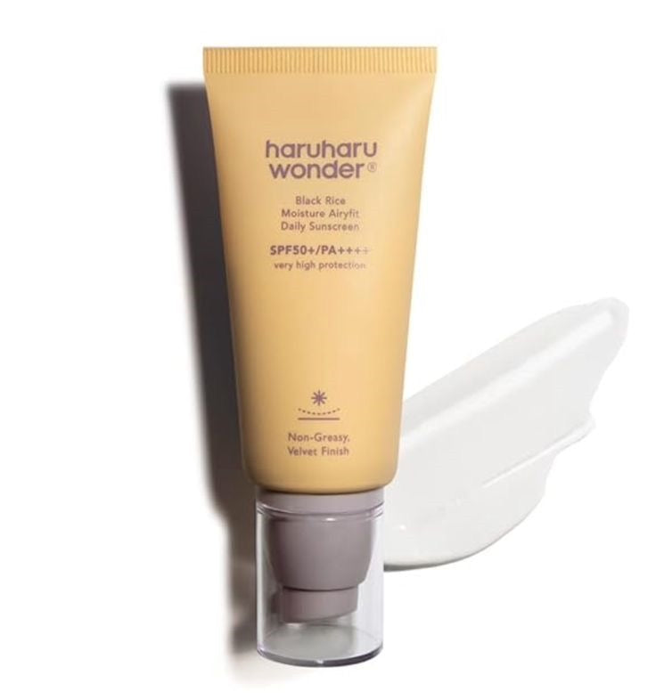 Haruharu Wonder Black Rice Moisture Airyfit Daily Sunscreen tube with cream texture swatch — EmartGCC Kuwait