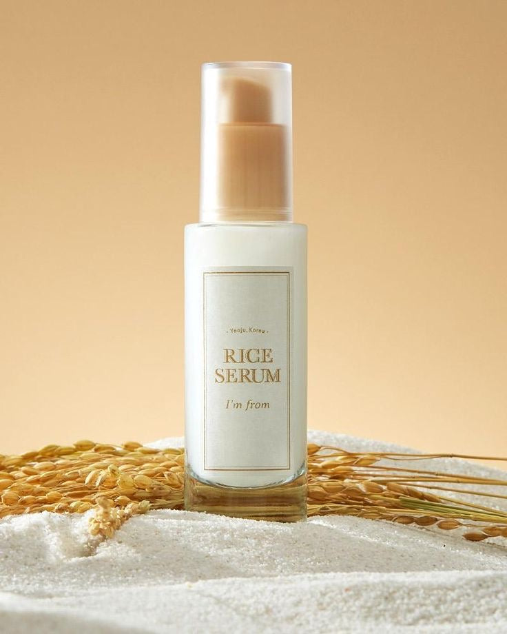 I'm From Rice Serum 30ml pump bottle resting on rice grains and stalks — EmartGCC Kuwait